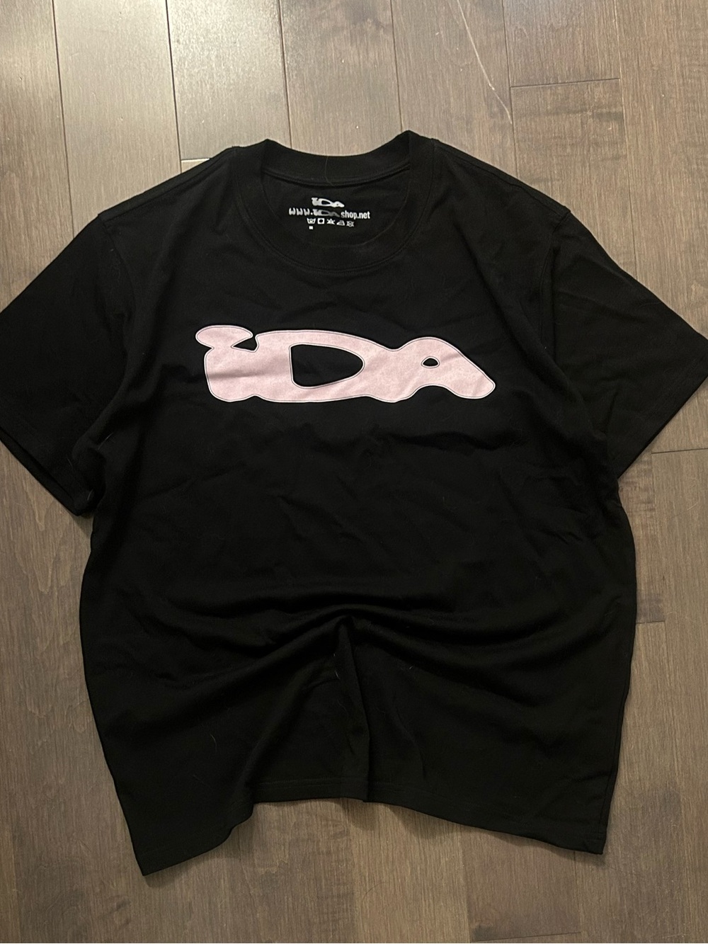 Black Men's Graphic T-Shirt with Pink Logo